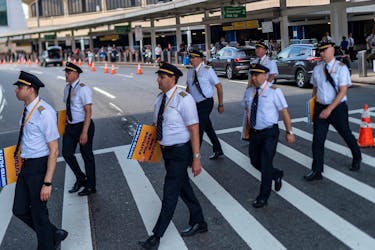 Pilots from United Airlines take part in an informational picket at Newark Liberty International Airport in Newark, New Jersey, U.S., May 12, 2023.