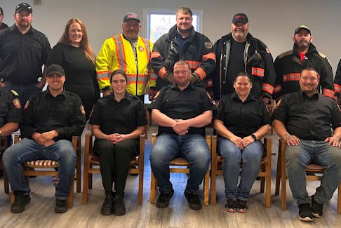 Members of the Port Morien Volunteer Fire Department. In the front row from left are James Bates, Remington Strongman, Katie Cameron, Justin Gilliam, Donna Martell, Jacob Egan, Jared Peach and Allan Cameron. In the back row from left are Harvey Butts, Lisa Boutilier, Brandon Bates, Michael Kelloway, Tayor Gilliam, Stewart MacPherson, David Murrant, Robbie Byrne, Donald Clements, Jonathan Eveleigh, Jarrett Byrne and Mavis Wadden. CONTRIBUTED/JAMES BATES