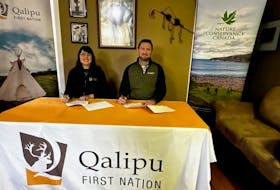 Chief Jenny Brake, left, and Piers Evans, N.L. program director with NCC signed an MOU to safeguard a vital wilderness area near Gander, known as Charlie’s Place. Contributed