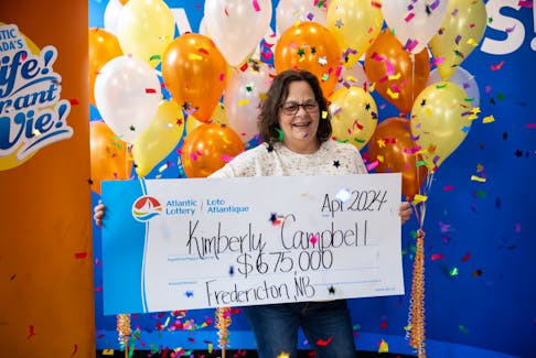 Kim Campbell is "Set for Life" after winning Atlantic Lottery's $4 Scratch'N Win major prize. - Contributed