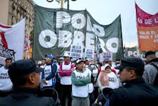 Demonstrators protest outside the National Congress on the day of the debate on Argentina's President Javier Milei's reform bill, known as the "omnibus bill", in Buenos Aires, Argentina April 29, 2024.