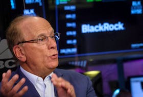 Larry Fink, Chairman and CEO of BlackRock, speaks during an interview with CNBC on the floor of the New York Stock Exchange (NYSE) in New York City, U.S., April 14, 2023. 