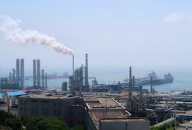 China National Petroleum Corporation (CNPC)'s Dalian Petrochemical Corp refinery is seen near the downtown of Dalian in Liaoning province, China July 17, 2018. Picture taken July 17, 2018.
