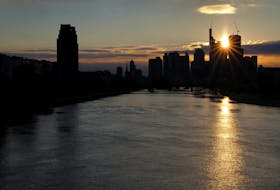 The skyline of the banking district is seen during sunset in Frankfurt, Germany, April 21, 2024. 