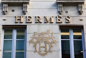 A logo of fashion house Hermes is seen outside a shop in Paris, France, April 15, 2024.