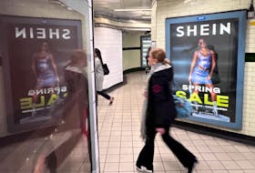 A person walks past an advertisement for Shein, in London, Britain, March 8, 2024.