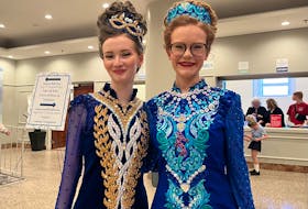 Charlotte Malone (left) and fellow Irish dancer in their costumes at the Atlantic Canadian Irish Dancing Championships on Saturday, April 27.