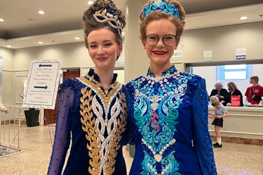 Charlotte Malone (left) and fellow Irish dancer in their costumes at the Atlantic Canadian Irish Dancing Championships on Saturday, April 27.
