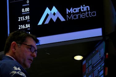 A specialist trader works at the post where Martin Marietta Materials is traded on the floor of the New York Stock Exchange (NYSE) in New York, U.S., March 6, 2017.