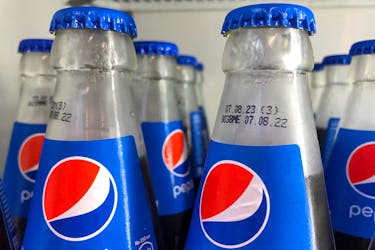 File photo: A view shows production and expiration dates on the bottles of Pepsi inside a refrigerator at a gym in central Moscow, Russia September 20, 2022.