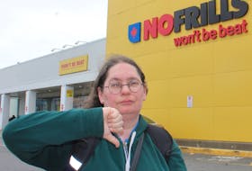 Mandy Ardelli of Sydney gives her disapproval of Loblaw Cos. Ltd. current high prices on Tuesday outside a No Frills on Welton Street in Sydney: "Many people were already boycotting (Loblaw-owned stores) simply because they can't afford it, but some people now have no choice." IAN NATHANSON/CAPE BRETON POST