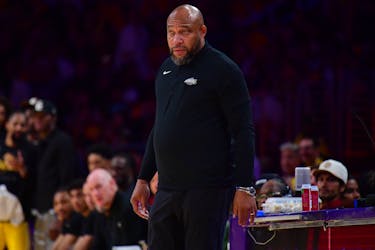 Apr 25, 2024; Los Angeles, California, USA; Los Angeles Lakers head coach Darvin Ham watches game action against the Denver Nuggets during the first half in game three of the first round for the 2024 NBA playoffs at Crypto.com Arena. Mandatory Credit: Gary A. Vasquez-USA TODAY Sports