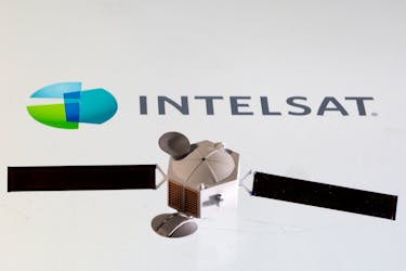 File photo: Satellite model is placed on Intelsat logo in this picture illustration taken April 4, 2022.