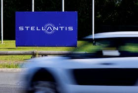 A view shows the logo of Stellantis at the entrance of the company's factory in Hordain, France, July 7, 2021.