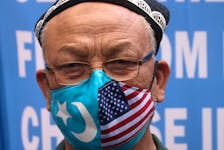 Jamal Rehi takes part in a protest in front of the U.S. State Department to commemorate Uyghur Doppa Day and to urge the U.S. and the international community to take action against China's treatment of the Uyghur people in the East Turkestan (Xinjiang) region, in Washington, U.S. May 5, 2021.