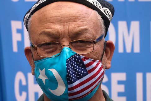 Jamal Rehi takes part in a protest in front of the U.S. State Department to commemorate Uyghur Doppa Day and to urge the U.S. and the international community to take action against China's treatment of the Uyghur people in the East Turkestan (Xinjiang) region, in Washington, U.S. May 5, 2021.