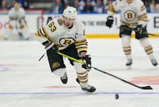 Boston Bruins forward Brad Marchand carries the puck against the Toronto Maple Leafs during an NHL playoff game at Scotiabank Arena in Toronto. - John E. Sokolowski-USA TODAY Sports