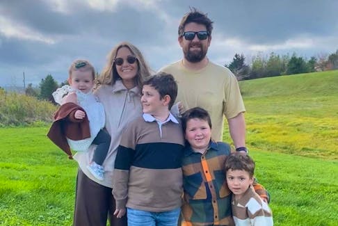 Kaitlin and Graham DeCoste pictured with their children, Paxton, Body, Riggs and Teddie. - Contributed