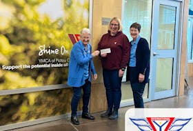 Pictou County Y Service Club Women members Eleanor Smith, left, and President, Carole Dunbar, far fight, presented a cheque on Jan. 5 to the Pictou County YMCA Child Care Centre. It was received by child care manager Tara Gallant. CONTRIBUTED