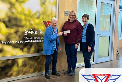 Pictou County Y Service Club Women members Eleanor Smith, left, and President, Carole Dunbar, far fight, presented a cheque on Jan. 5 to the Pictou County YMCA Child Care Centre. It was received by child care manager Tara Gallant. CONTRIBUTED