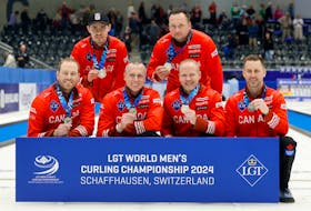 Canada's Brad Gushue rink won the silver medal at the LGT World Men’s Curling Championship on Sunday in Schaffhausen, Switzerland. Front row, from left are lead Geoff Walker, second E.J. Harnden, third Mark Nichols and Gushue. Back row are  alternate Kyle Doering and coach Caleb Flaxey. REUTERS/Stefan Wermuth