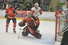 Rooftech St. John’s Senior Capitals goaltender Kyle Downer and his teammates won the Herder Memorial Trophy last weekend after sweeping the Deer Lake Red Wings in the championship finals. Nicholas Mercer/The Telegram