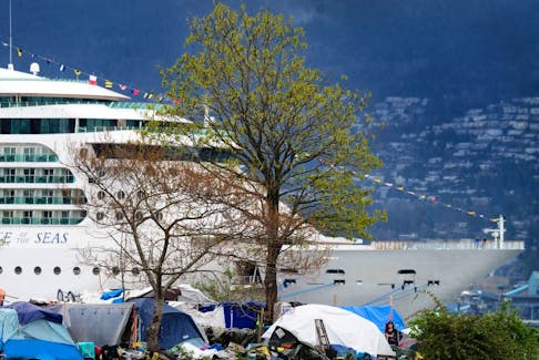 Scenes from the homeless encampment at Crab Park with a cruise ship docked at Canada Place as the City continues to remove tents from sidewalks in the Downtown Eastside of Vancouver, B.C.., on April 23, 2023.