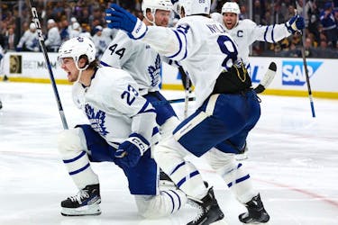 Matthew Knies, left, of the Toronto Maple Leafs celebrates after scoring the game-winning goal against the Boston Bruins to win the game 2-1 in overtime of Game 5 of the First Round of the 2024 Stanley Cup Playoffs at TD Garden on Tuesday, April 30, 2024, in Boston, Mass. 