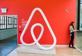 A woman talks on the phone at the Airbnb office headquarters in the SOMA district of San Francisco, California, U.S., August 2, 2016. 