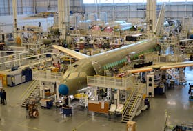 An Airbus A220 passenger jet, formerly known as the Bombardier CSeries, stands in the final assembly line where the European company plans a $30 million investment to keep up with forecast demand, in Mirabel near Montreal, Quebec, Canada January 14, 2019. Airbus acquired the former Bombardier jet in 2018.