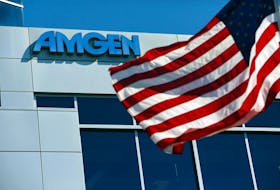 An Amgen sign is seen at the company's office in South San Francisco, California October 21, 2013.