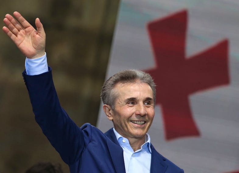 Bidzina Ivanishvili, former prime minister and founder of the Georgian Dream party, waves during a pro-government rally in support of a bill on "foreign agents" in Tbilisi, Georgia April 29, 2024.