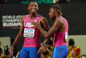 Athletics - World Athletics Championship - Men's 200m Final - National Athletics Centre, Budapest, Hungary - August 25, 2023 Noah Lyles of the U.S. reacts after winning the men's 200m final with second placed Erriyon Knighton of the U.S.