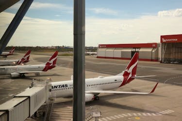 Qantas planes are seen at a domestic terminal at Sydney Airport in Sydney, Australia, November 16, 2020. 