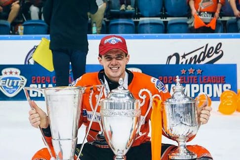 Mitchell Balmas of Sydney is shown with the trophies he and the Sheffield Steelers won in the Elite Ice Hockey League this season. Balmas and the team recently captured the Grand Slam championship. INSTAGRAM PHOTO