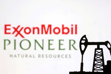 ExxonMobil and Pioneer Natural Resources logos are seen in this illustration taken, October 8, 2023.