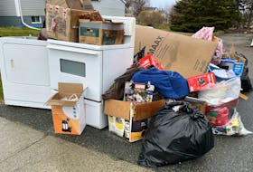 Heavy garbage is seen ready for pickup in New Waterford. Cape Breton Regional Municipality has said heavy garbage pickup will begin Monday, May 6. Prior to that some people collect reusable, repairable and working items from others' curbside trash piles. BARB SWEET/CAPE BRETON POST