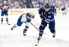 Apr 30, 2024; Winnipeg, Manitoba, CAN; Winnipeg Jets defenseman Josh Morrissey (44) is stick checked by Colorado Avalanche right wing Mikko Rantanen (96) in the first period in game five of the first round of the 2024 Stanley Cup Playoffs at Canada Life Centre. Mandatory Credit: James Carey Lauder-USA TODAY Sports