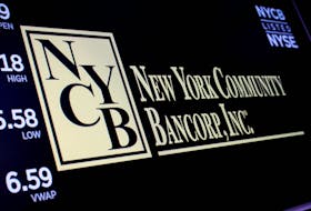 A screen displays the trading information for New York Community Bancorp on the floor at the New York Stock Exchange (NYSE) in New York City, U.S., January 31, 2024. 