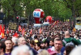 People attend the traditional May Day labour union march in Paris, France, May 1, 2024.