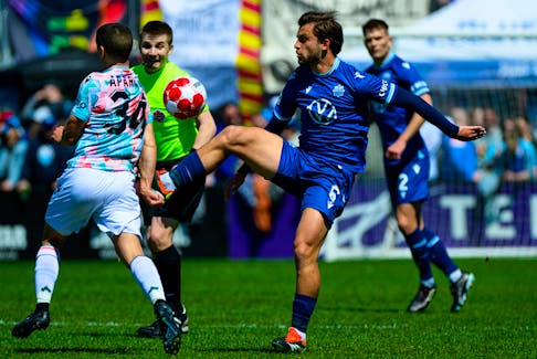 Lorenzo Callegari of the Halifax Wanderers (right) battles with Manny Aparicio of Atletico Ottawa early into a Canadian Premier League match Saturday afternoon at the Wanderers Grounds. - CANADIAN PREMIER LEAGUE