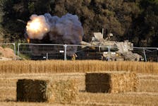 An Israeli mobile artillery unit fires towards Gaza, amid the ongoing conflict between Israel and the Palestinian Islamist group Hamas, near the Israel-Gaza border, in Israel, April 30, 2024.