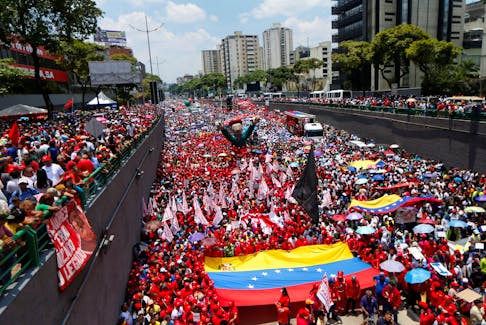 Supporters of Venezuela's President Nicolas Maduro participate in May Day celebrations in Caracas, Venezuela May 1, 2024.