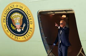 U.S. President Joe Biden looks out from Air Force One upon his arrival, in Mountain View, California, U.S., May 9, 2024. 