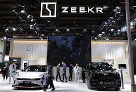 Zeekr's electric vehicles (EV) 001 and 009 are seen displayed at its booth during the first China International Supply Chain Expo (CISCE) in Beijing, China November 28, 2023.
