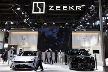 Zeekr's electric vehicles (EV) 001 and 009 are seen displayed at its booth during the first China International Supply Chain Expo (CISCE) in Beijing, China November 28, 2023.