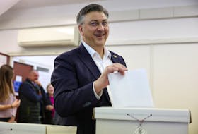 Croatian Prime Minister and Croatian Democratic Union (HDZ) party's President Andrej Plenkovic votes in the parliamentary election at a polling station in Zagreb, Croatia, April 17, 2024.