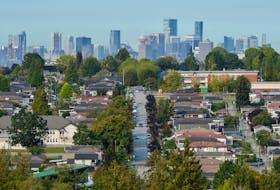 Single family homes are seen against the skyline of Vancouver, British Columbia, Canada September 30, 2020.