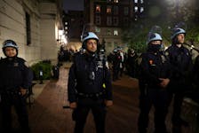 Police stand guard at Columbia University, where a building occupation and protest encampment had been set up in support of Palestinians, during the ongoing conflict between Israel and the Palestinian Islamist group Hamas, in New York City, U.S., April 30, 2024.