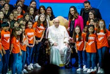 Pope Francis poses for a group picture at the "The General State of the Birth Rate" conference on Italy's sliding birthrate, in Rome, Italy, May 10, 2024.
